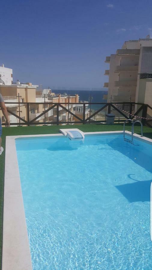 By The Sea - Rooftop Pools Apartment อาร์มาซอง เด เปรา ภายนอก รูปภาพ